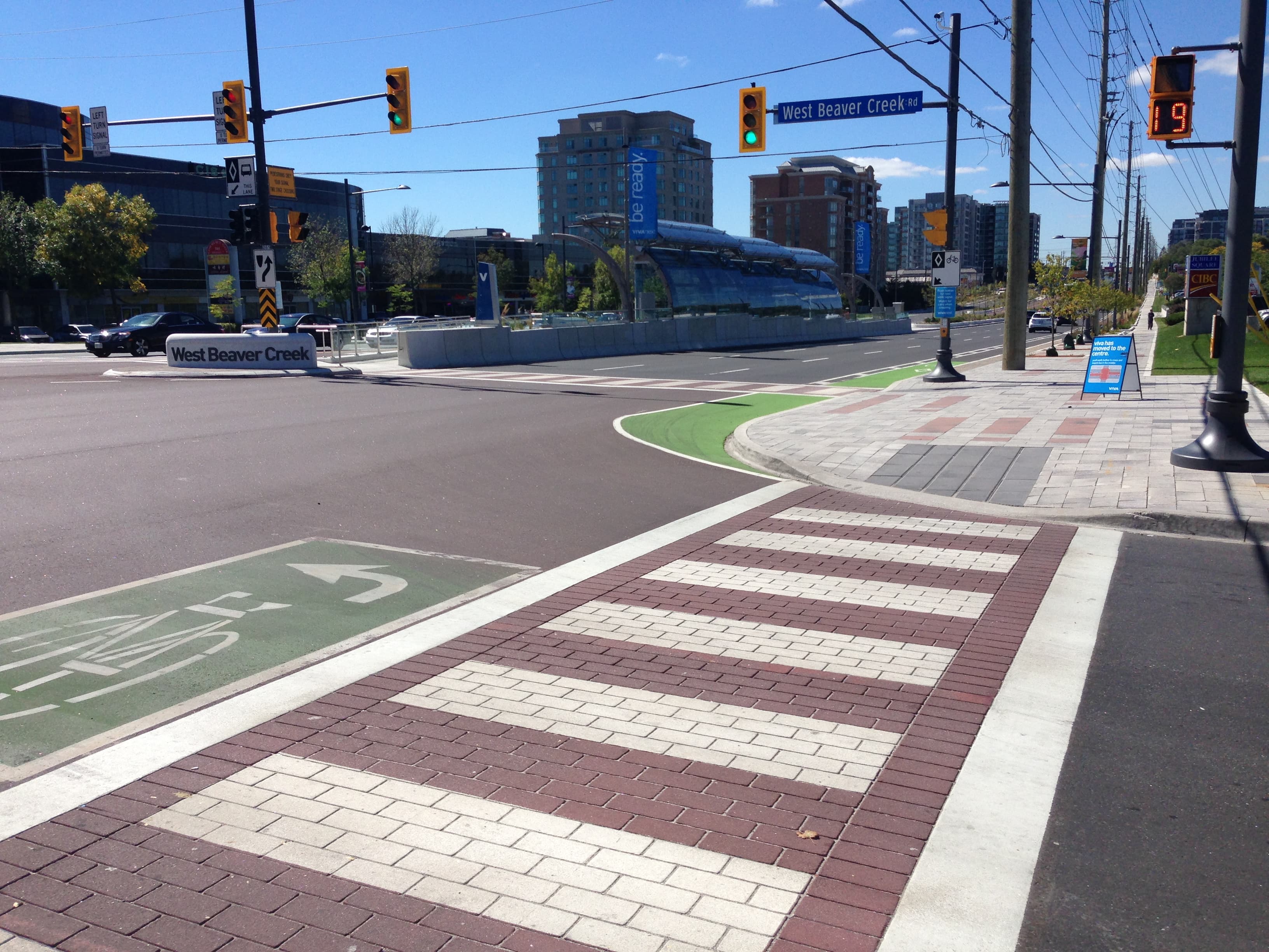 High-visibility decorative crosswalk with TrafficPatternsXD preformed thermoplastic — pedestrian safety surface for Vision Zero Canadian streetscape