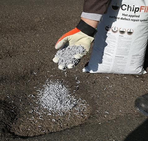 ChipFill decorative pavement by HUB Surface Systems — installation photo 1