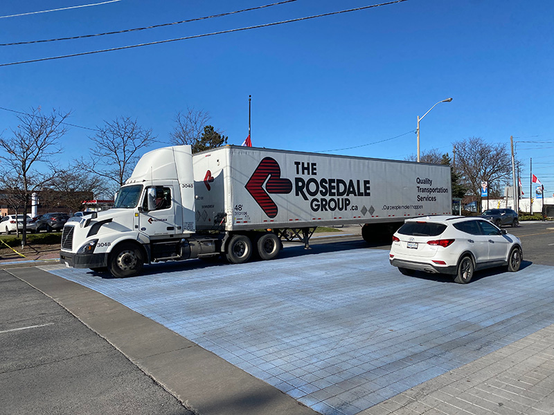 StreetPrint stamped asphalt intersection showing intact colour and texture after multiple Canadian winters