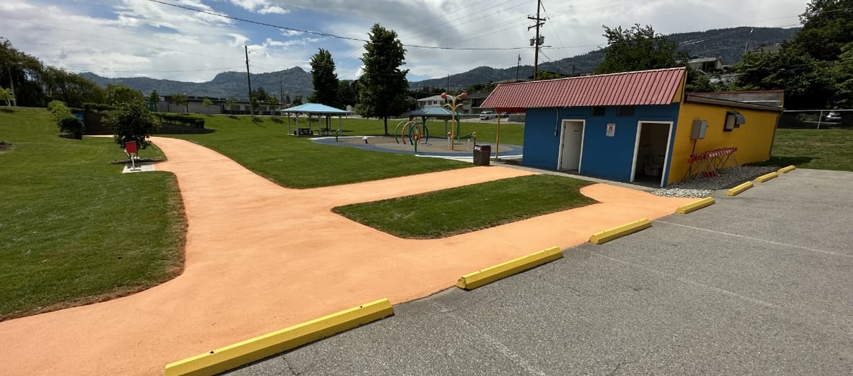StreetBondSR solar reflective coating applied to pedestrian pathway in Osoyoos, BC showing cooler, lighter surface treatment