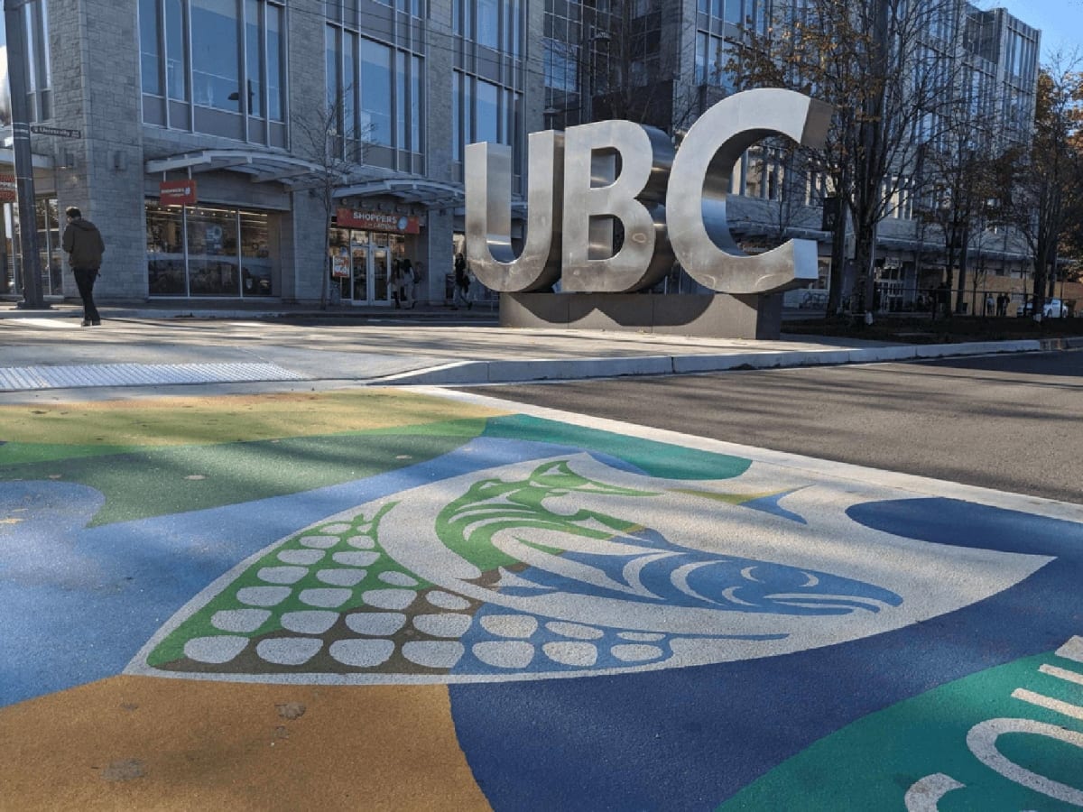 UBC Musqueam crosswalk featuring traditional Coast Salish weaving patterns translated into stamped asphalt using DecoMark system
